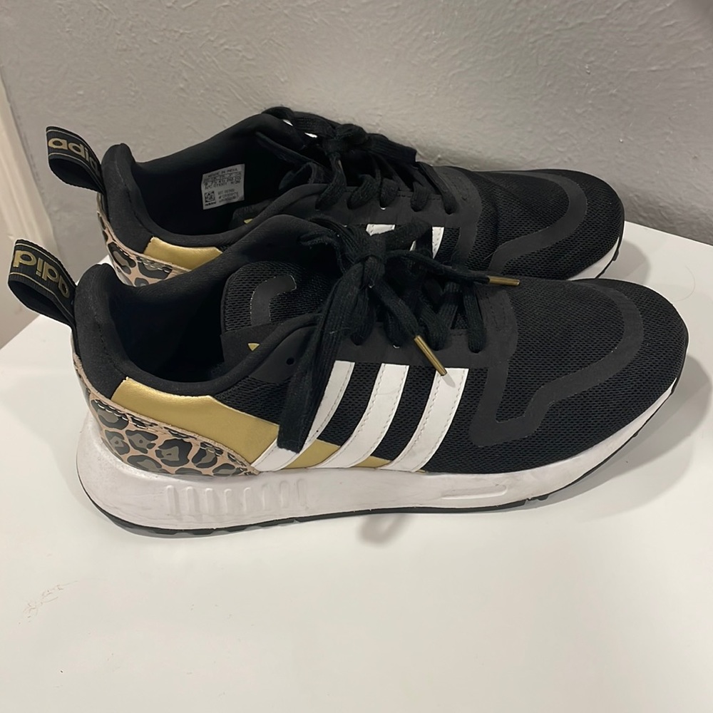 Black white and cheetah adidas